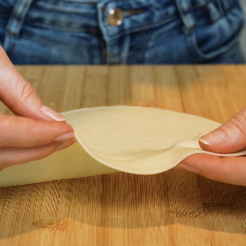 Thinly rolled dough circle for Azerbaijani Qutab